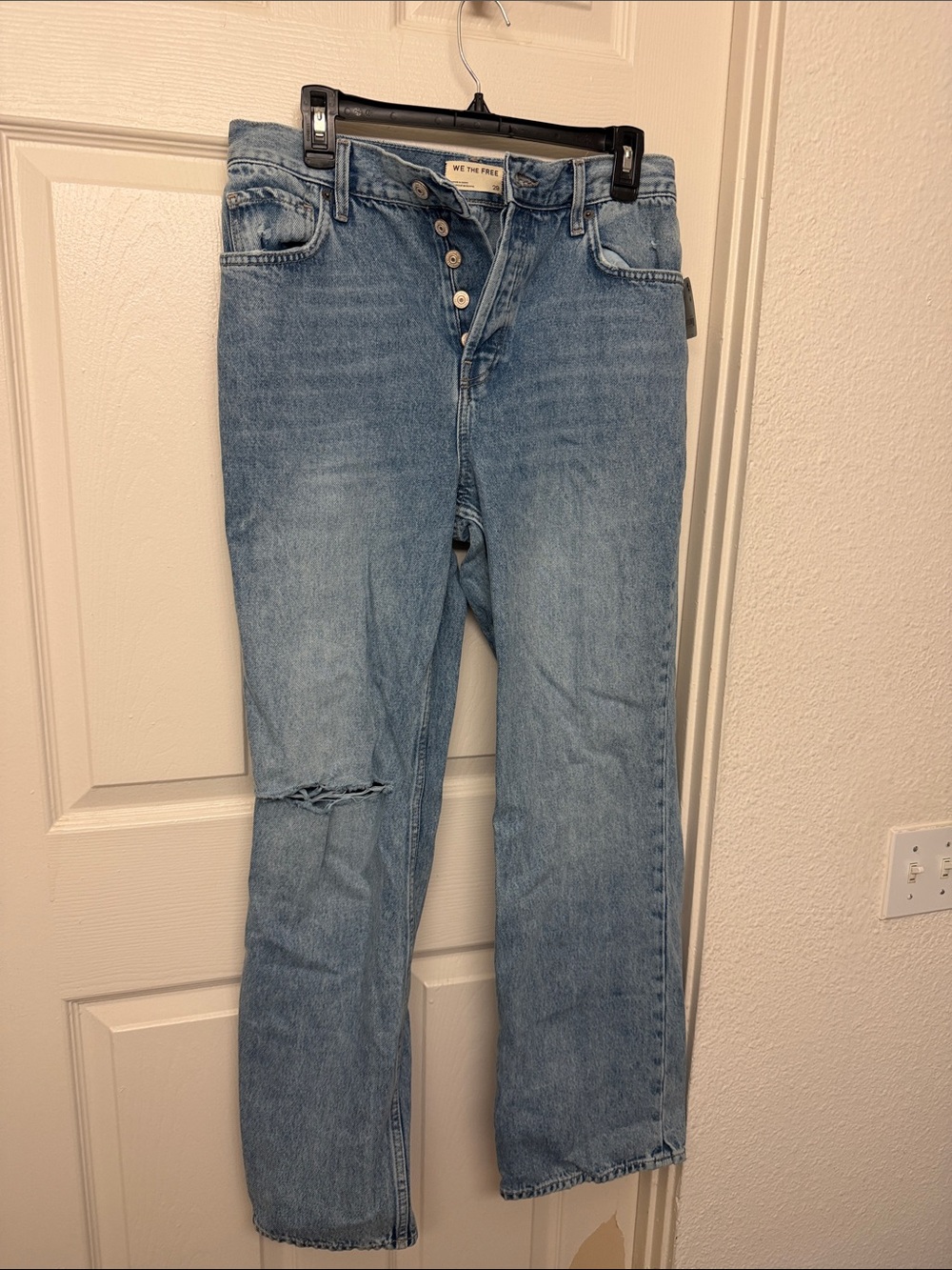 We The Free Light Wash High-Rise bootcut Jeans with Knee Distress
